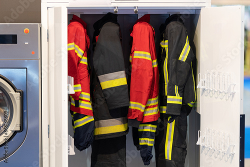Firefighter uniform inside a cabinet.