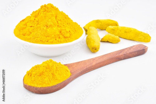 Haladi powder condiment spice on white background photo