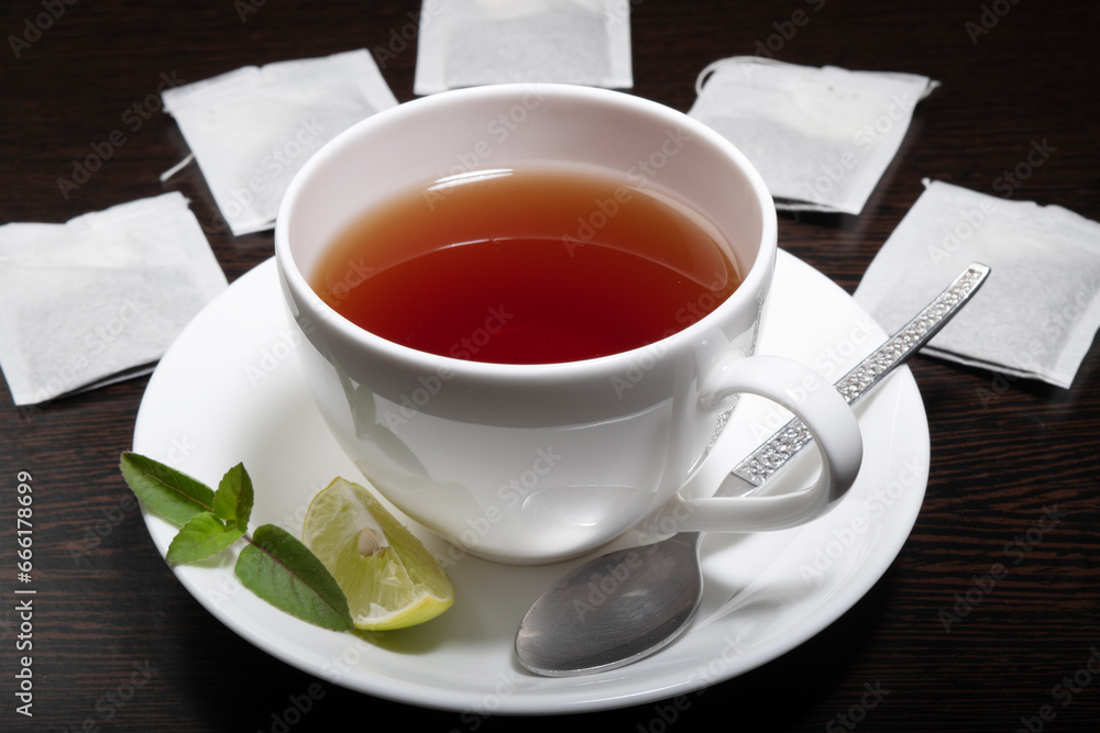 Lemon tea cup with tea bag on the table Lemon tea cup with tea bag on the table