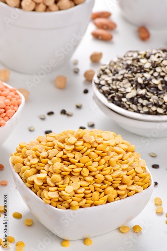 Raw chana dal in bowl on white background