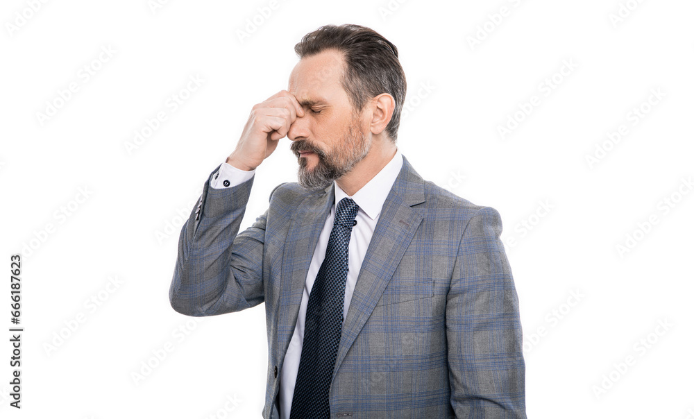 Mature businessman in suit isolated on white. Headache and eye strain. Chronic headache. Migraine from overwork, frustration. Business man in suit with headache. Businessman has stress Mature businessman in suit isolated on white. Headache and eye strain. Chronic headache. Migraine from overwork, frustration. Business man in suit with headache. Businessman has stress