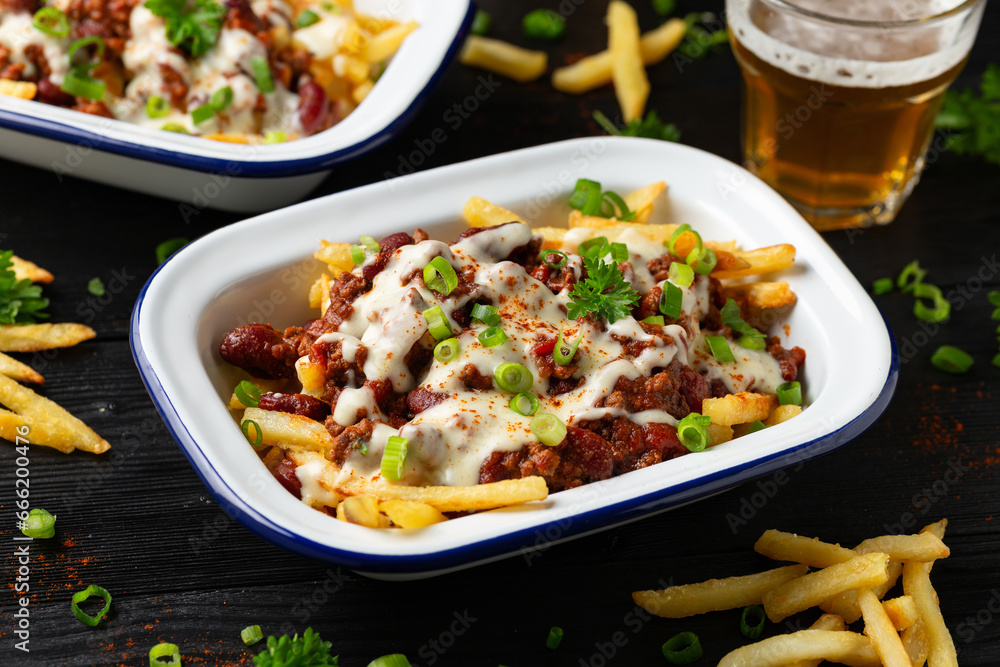 Chili Cheese Potato Fries topped with hot minced beef and cheese sauce Chili Cheese Potato Fries topped with hot minced beef and cheese sauce