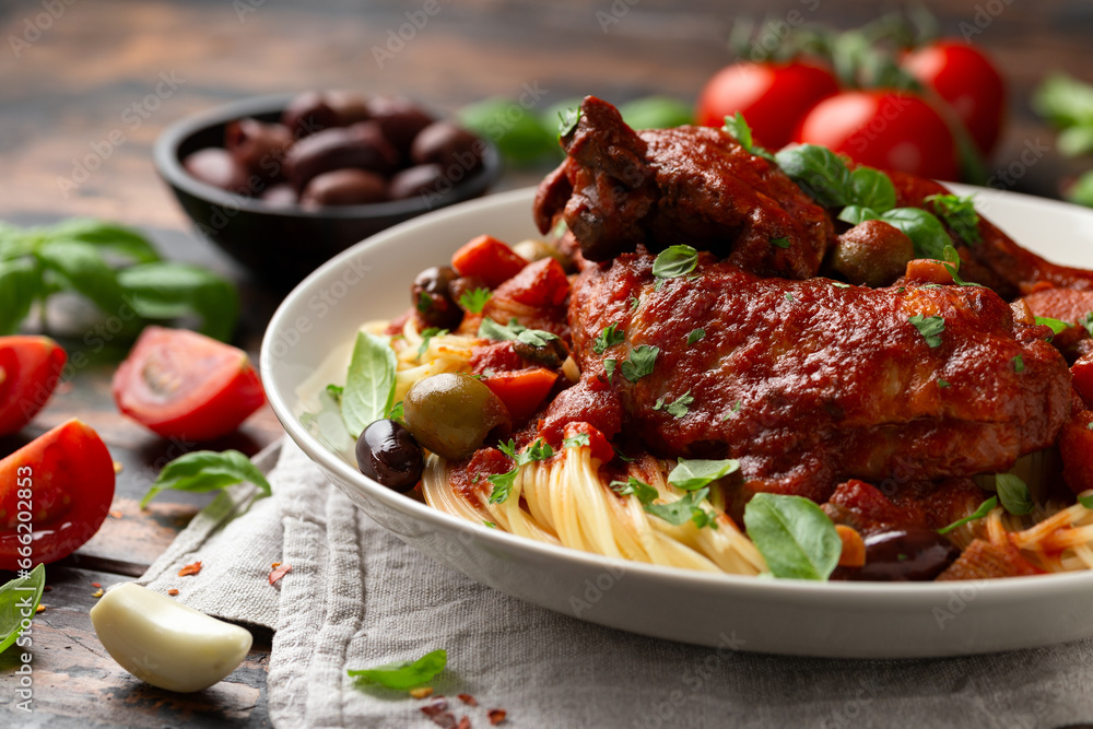 Cacciatore Chicken with spaghetti, vegetables, olives and tomatoes