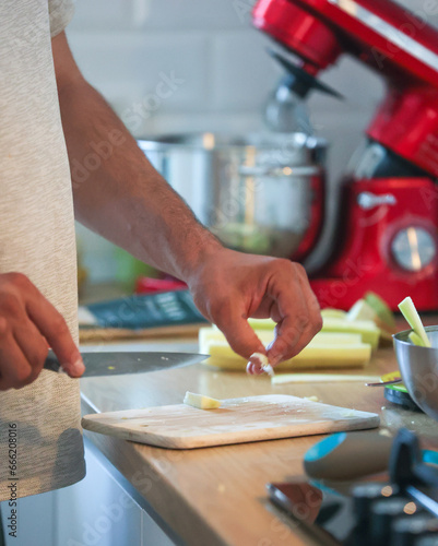 Man cooking in kitchen hands close-up