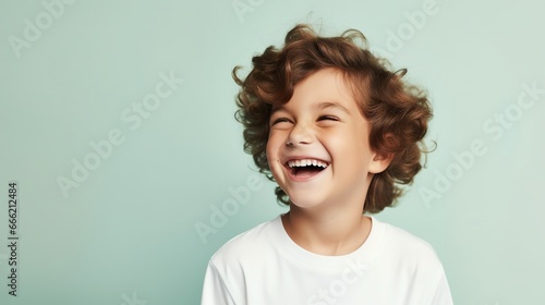 Cute Laughing Boy isolated on the Minimalist Pastel Color Background
