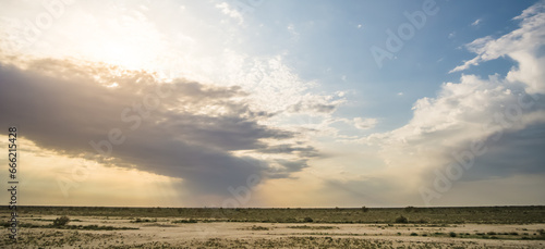 Atmospheric deep sky in the desert of Uzbekistan at sunset in the evening  minimalistic clouds for background