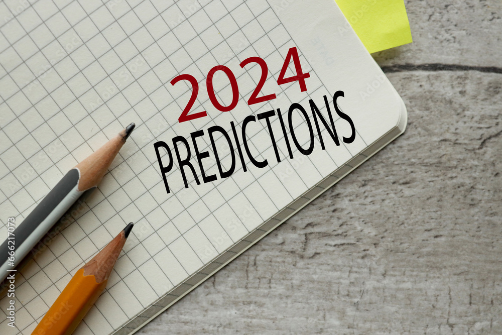 notebook open on a wooden table. words 2024 predictions notebook open on a wooden table. words 2024 predictions