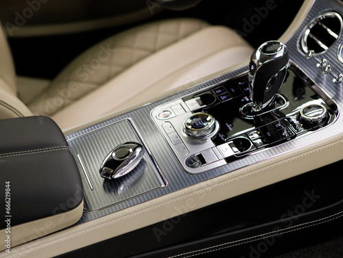 Close-focus of a remote control key of a modern expensive famous car © AvokadoStudio
