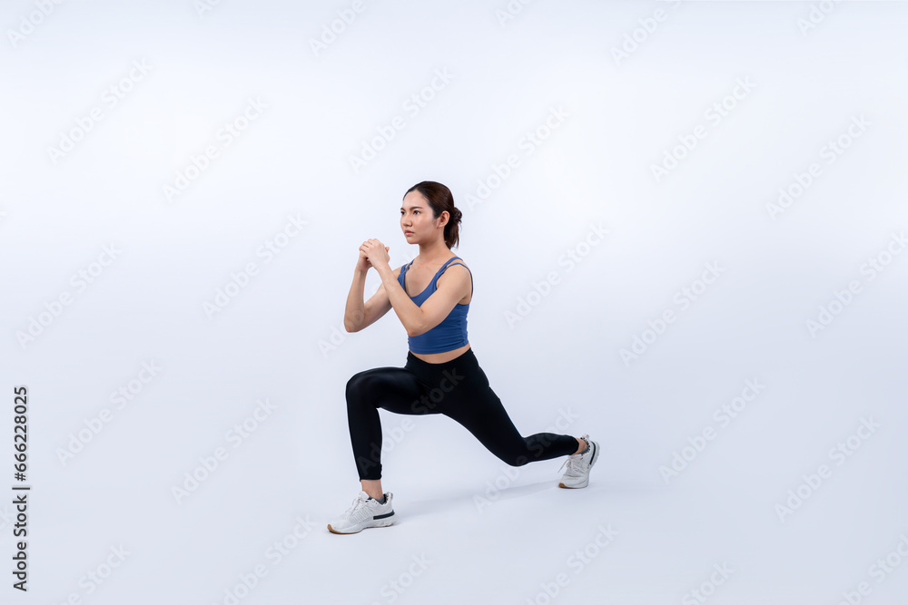 Young attractive asian woman in sportswear stretching before fitness exercise routine. Healthy body care workout with athletic woman warming up on studio shot isolated background. Vigorous