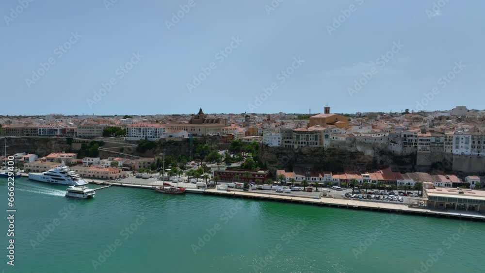 Ferry boat navigating in Mahon harbor aerial sunny day Minorca Ferry boat navigating in Mahon harbor aerial sunny day Minorca