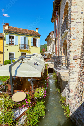 Beautiful impressions in the mill village of Borghetto on the river Minico, in the south of Lake Garda, in Veneto, Italy.