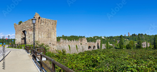 Beautiful view from the medieval bridge over the Minico (Ponte Visconteo) to the Scaligeri Castle, near the village of Borghetto. photo