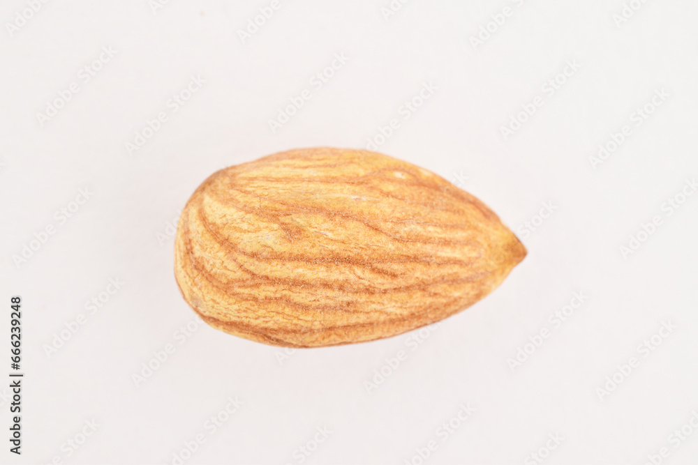 Closeup of almond in white background Closeup of almond in white background