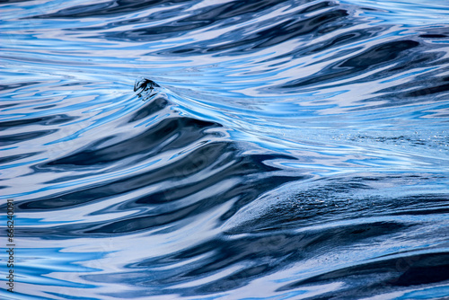 Reflection of the sky on the sea waves. HDR Image (High Dynamic Range).