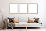 Wall art mockup. Three canvas with wooden borders. Living room with white wall