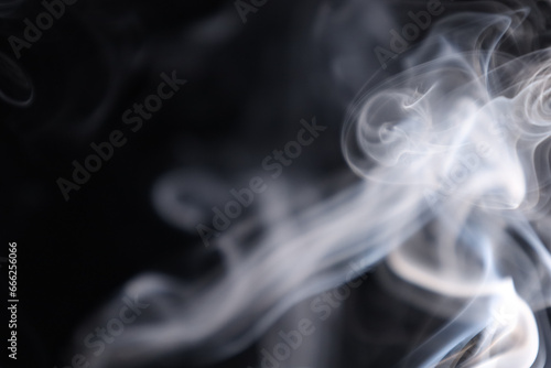Fototapeta Naklejka Na Ścianę i Meble -  White silver smoke on a dark background, colourful abstract, white fog, minimalistic background, detailed smoke shapes	