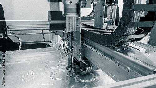 Industrial 3d printer printing a tool