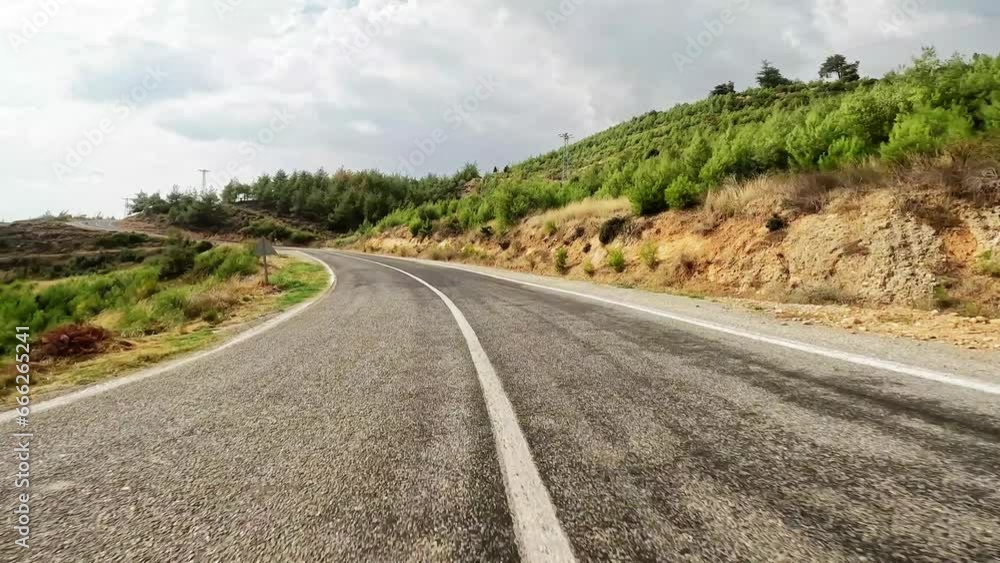 Road trip by car along the mountain roads and serpentines on sanset of Turkey. Road trip by car along the mountain roads and serpentines on sanset of Turkey.