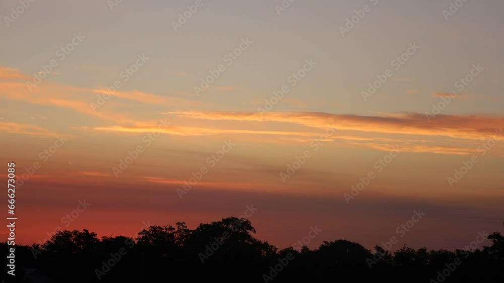 Very beautiful orange sunrise on the background of trees Very beautiful orange sunrise on the background of trees