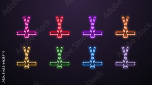 A set of neon icons of hockey sticks with a hockey puck in different colors on a dark background.