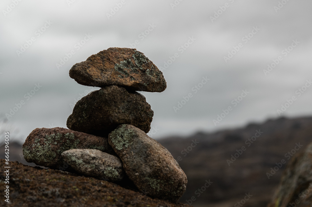 stack of zen stones pacha mama cairn guide landscape of mountains in the mountains of Cordoba on vacation to do traiking or go sightseeing vacations stack of zen stones pacha mama cairn guide landscape of mountains in the mountains of Cordoba on vacation to do traiking or go sightseeing vacations