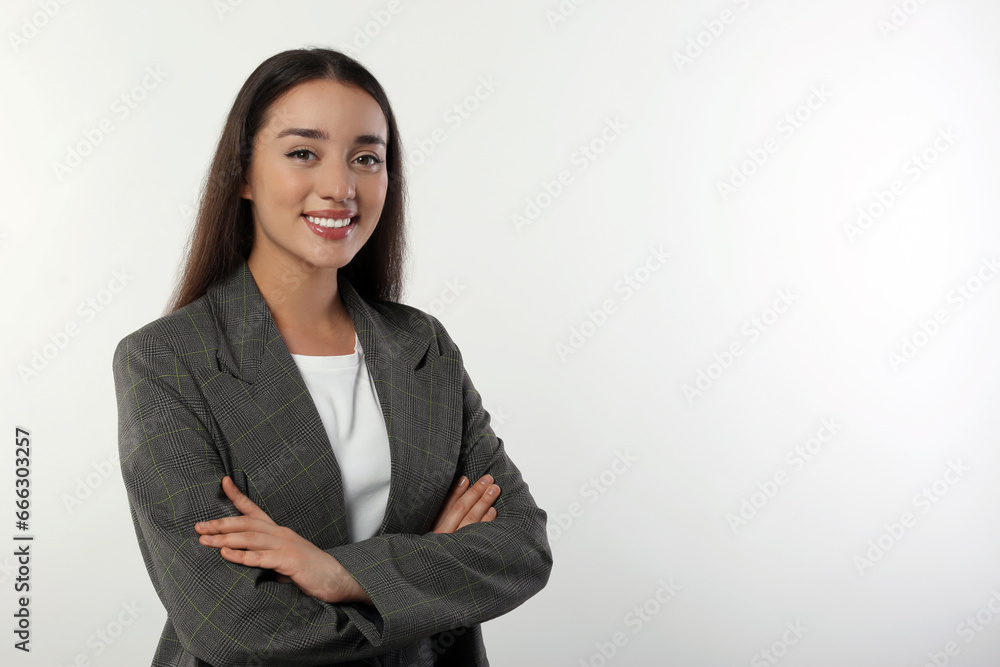 Portrait of happy young woman in stylish jacket on white background. Space for text Portrait of happy young woman in stylish jacket on white background. Space for text
