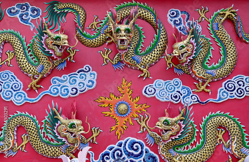 BANGKOK, THAILAND : October 22, 2023 - Tha Colorful Dragon Decoration on the black wall background in The TungTrakul Trokchan Association at Thailand.