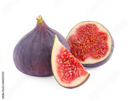 Whole and cut ripe figs isolated on white