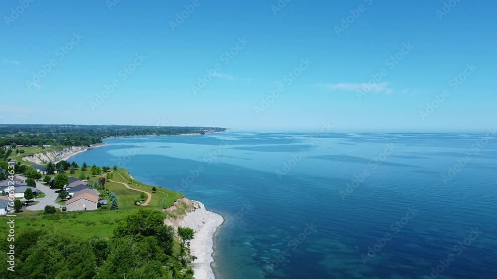 Beautiful views of blue water and sandy beaches near new detached homes housing development Beautiful views of blue water and sandy beaches near new detached homes housing development