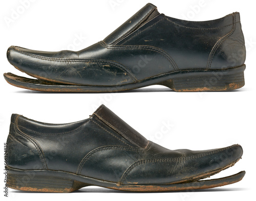 Fotografie set of old used business shoes isolated white background, black dirty leather fo