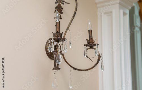 chandelier with intricate crystal details, casting elegant light patterns in a luxurious setting, epitomizing opulence, grandeur, and sophistication