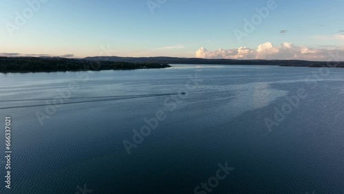 Evening atmosphere with motorboat, drone shot, Lake Constance, Untersee, Berlingen, Thurgau, Switzerland, Europe photo