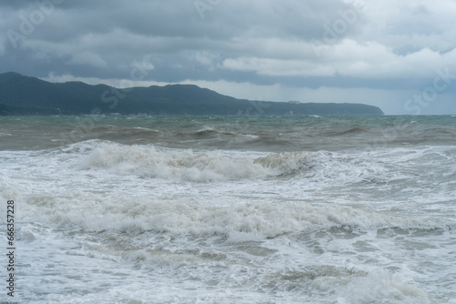 storm on the black sea  waves crashing on the shore  brown water