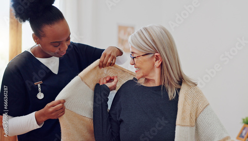 Senior woman, nurse and help with clothes, smile and care in retirement, nursing home and support. African caregiver, elderly lady and happy with getting dressed with assisted living, love and house