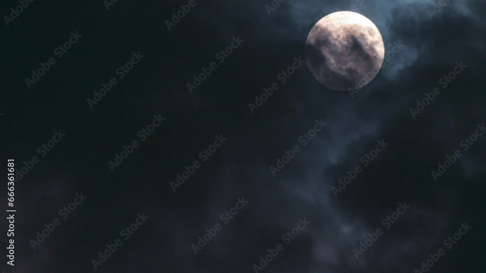 Atmospheric video with full moon and clouds. Close-up. Mystical and atmospheric content. Time lapse of the night sky Atmospheric video with full moon and clouds. Close-up. Mystical and atmospheric content. Time lapse of the night sky