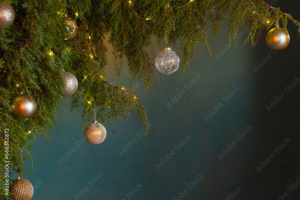 christmas decor with golden balls on background  dark wall