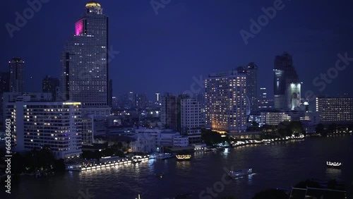 Wallpaper Mural An aerial view of the lively nightlife along Chao Phraya River in Bangkok, showcasing the glistening city lights and passing boats Torontodigital.ca