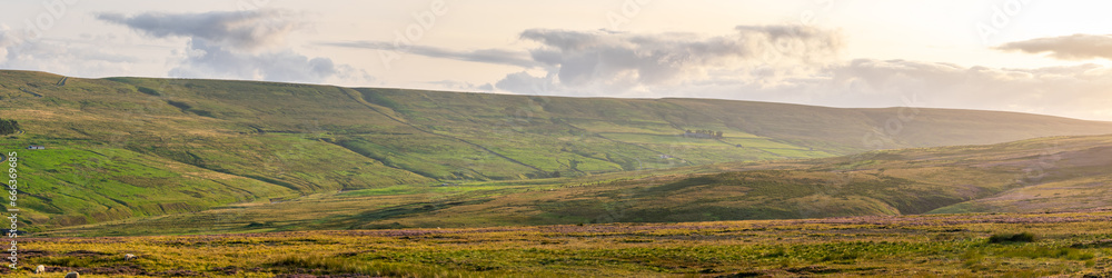 panoramic view looking out over walled pastures in the North Pennines Area of Outstanding Natural Beauty (ANOB), near Stanhope, Durham, UK