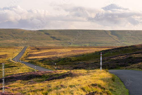 a quiet road running through the North Pennines Area of Outstanding Natural Beauty  ANOB   near Stanhope  Durham  UK