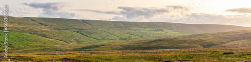 panoramic view looking out over walled pastures in the North Pennines Area of Outstanding Natural Beauty (ANOB), near Stanhope, Durham, UK