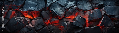 A stone wall background with a black rock texture, accentuated by bold red veins and vivid red nuggets, marries the rugged beauty of nature with a fiery, passionate touch. photo