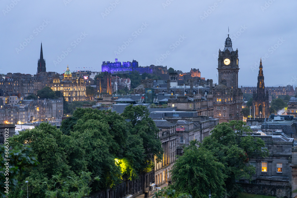 view of Edinburgh Castle, Scotland from Calton Hill at dusk on a gloomy day
