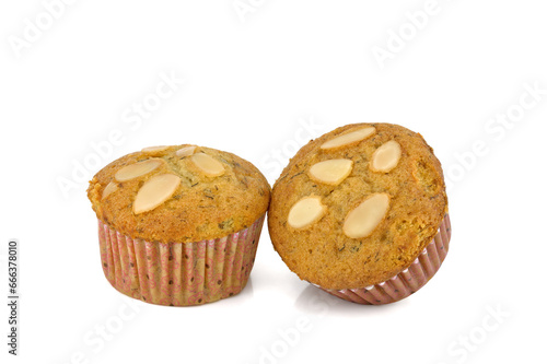 Muffin cake with almond on white background