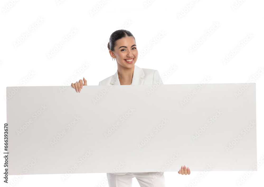 attractive businesswoman holding and presenting empty board attractive businesswoman holding and presenting empty board