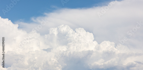 White clouds on a blue sky as a background