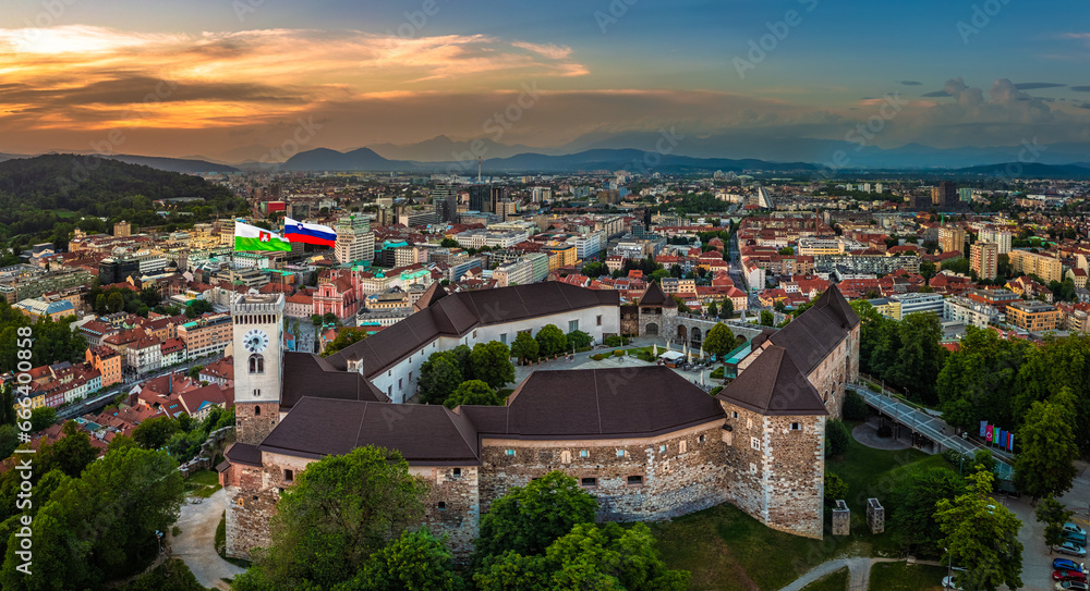 Ljubljana, Slovenia - Aerial panoramic view of Ljubljana Castle on a summer afternoon with Franciscan Church of the Annunciation, Ljubljana Cathedral and skyline of the capital of Slovenia at sunset