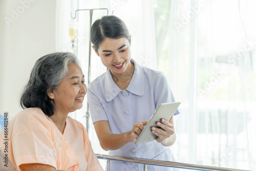 nurse Inform health examination results to encourage senior elderly woman patients in the hospital- medical senior concept
