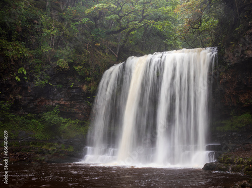 Waterfall Sgwd yr Eira on the four waterfalls walk in Brecon Beacons national park Wales UK photo
