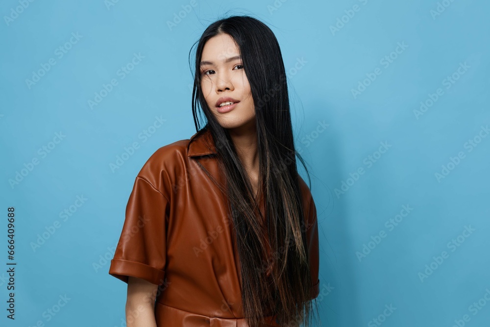 Background woman happy attractive asian trendy studio girl lifestyle cute portrait blue beauty smile