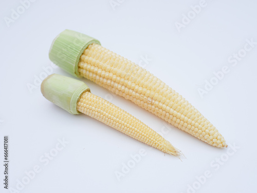 peeled baby corn isolated on white background